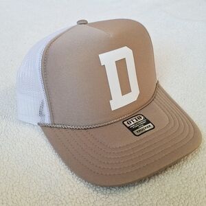 Disney Inspired DIY Tan and White Trucker Hat with Bold D Logo.